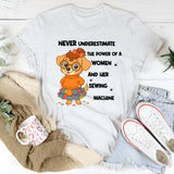 Never Underestimate the Power of a Woman and Her Sewing Machine T-Shirt